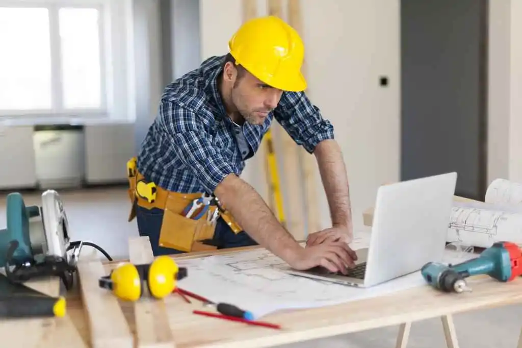 stock-photo-hard-working-building-contractor