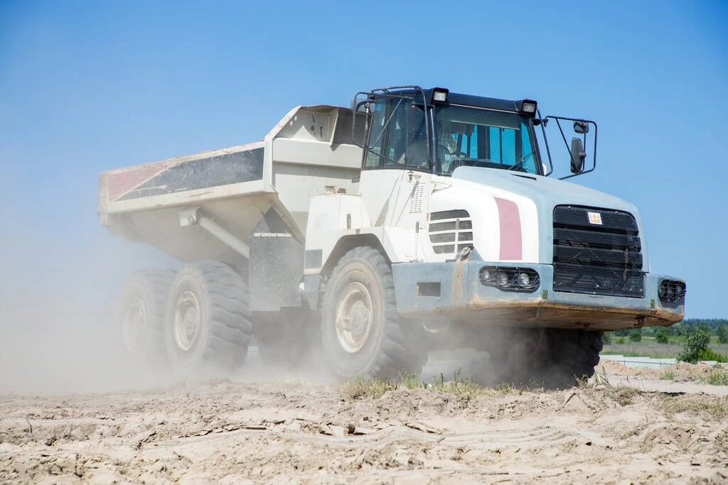 stock-photo-large-articulated-dump-truck-white 